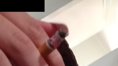 A Gold Coast teenager who was in foster care is now on the streets, smoking and using drugs - in this blurred out photograph she had a white powder on her tongue.