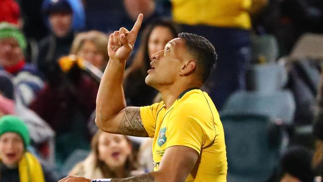 Israel Folau of the Wallabies celebrates after scoring a try in Canberra.