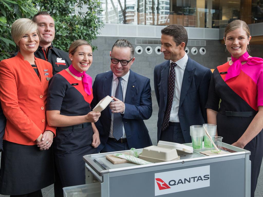 Alan Joyce and the ‘Green Team’ from Qantas and Jetstar show off the new alternative packaging passengers can expect to soon see on-board. Picture: Qantas