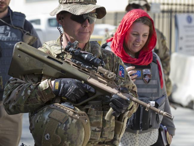 Australian Army soldier Private Jess Flanagan provides force protection as a ‘Guardian Angel’ for Australian officials travelling outside Headquarters Resolute Support during their deployment to Operation Highroad in Kabul, Afghanistan.