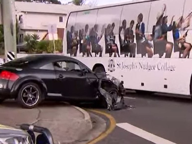 Emergency services have been called after a car and school bus collided at Nudgee this afternoon. Picture: 9 News Queensland