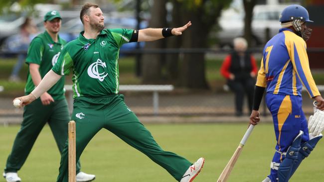 Tom McQuinn bowling for Croydon. Picture: Stuart Milligan