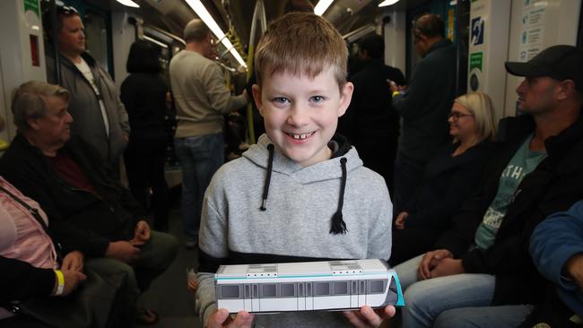 Train expert James Hurst, 8, with his toy train. Picture: David Swift.