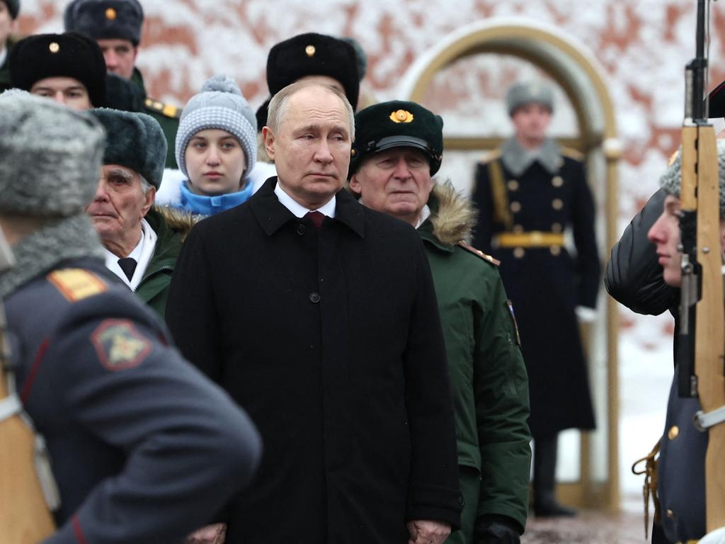 Vladimir Putin attends a wreath-laying ceremony at the Tomb of the Unknown Soldier by the Kremlin Wall to mark the Defender of the Fatherland Day in Moscow. Picture: AFP