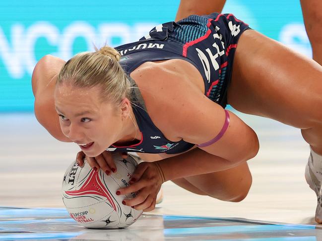 MELBOURNE, AUSTRALIA - JUNE 10: Hannah Mundy of the Vixens attempts to keep the ball in play during the round nine Super Netball match between Melbourne Vixens and Melbourne Mavericks at John Cain Arena, on June 10, 2024, in Melbourne, Australia. (Photo by Kelly Defina/Getty Images)