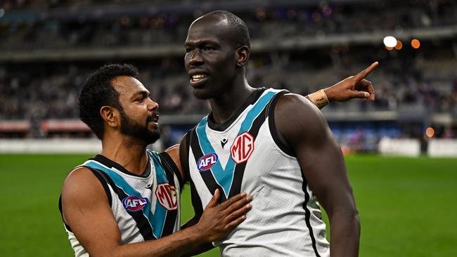 Willie Rioli and Aliir Aliir of the Power celebrate the win during the 2024 AFL Round 24 match. Picture: Daniel Carson/AFL Photos via Getty Images.