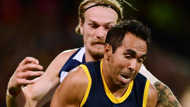 Eddie Betts of the Adelaide Crows is tackled by Tom Stewart. Picture: Mark Brake/Getty Images