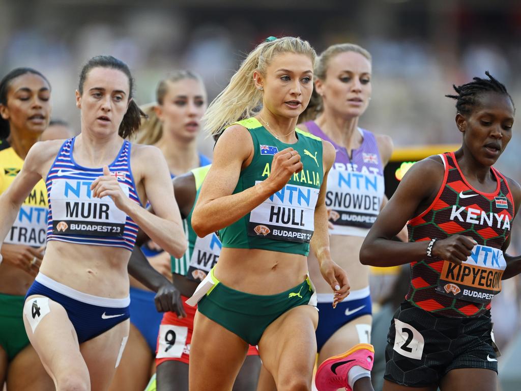 Jessica Hull on the shoulder of Kenyan great Faith Kipyegon at the World Athletics Championships. Picture: Getty Images