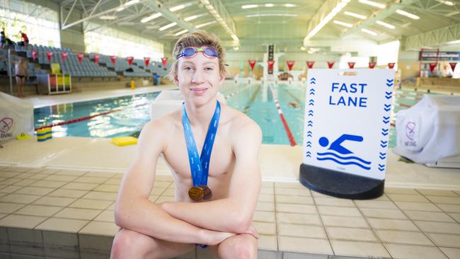 Max Giuliani after winning under-15 gold at the 200m freestyle at the Australian Age Championships. Picture: RICHARD JUPE