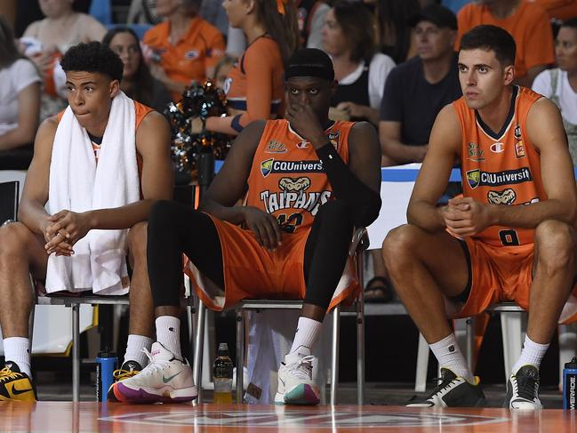 The Taipans bench looks on. (Photo by Ian Hitchcock/Getty Images)