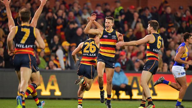 Tom Doedee of the Crows celebrates after kicking a goal during the round 15 AFL match between the Adelaide Crows and the West Coast Eagles at Adelaide Oval. Picture: Daniel Kalisz/Getty Images