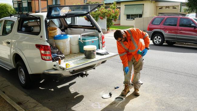 An Environment Protection Authority (EPA) worker tests groundwater.