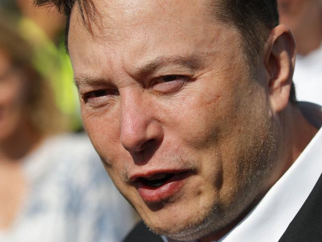 (FILES) In this file photo taken on September 3, 2020 Tesla CEO Elon Musk talks to media as he arrives to visit the construction site of the future US electric car giant Tesla, in Gruenheide near Berlin. - Twitter whistleblower Peiter Zatko told the US Congress on September 13, 2022 that the platform ignored his security concerns, as its shareholders decide whether to approve a $44 billion takeover deal that Elon Musk is trying to exit. (Photo by Odd ANDERSEN / AFP)