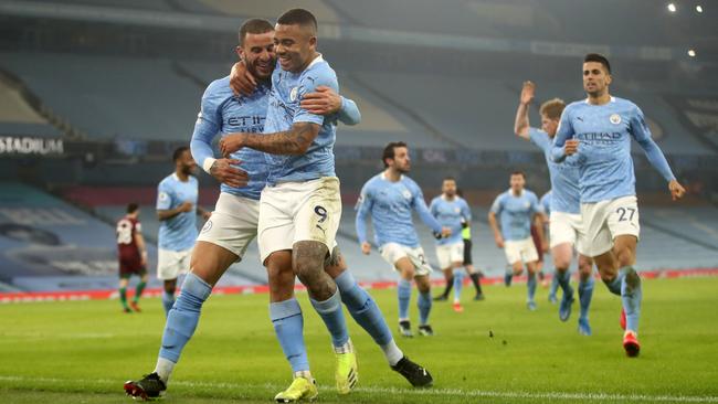 Manchester City’s Gabriel Jesus celebrates with teammate Kyle Walker after scoring their side's second goal against Wolverhampton Wanderers at Etihad Stadium. Picture: Getty Images