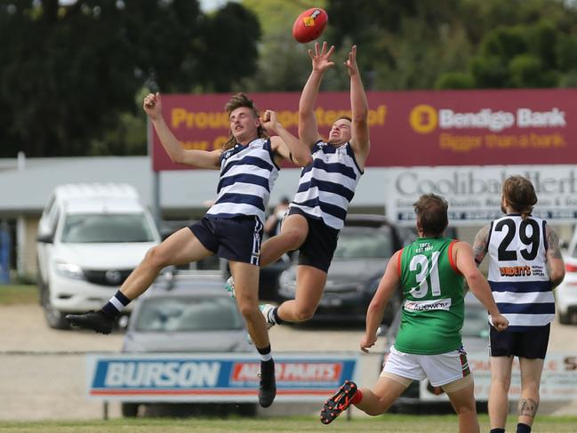 Pearcedale's Mitch Johnson flies for a mark over teammate Riley Bradshaw (left) in a practice match against Tooradin-Dalmore last weekend. Picture: Doug Farr