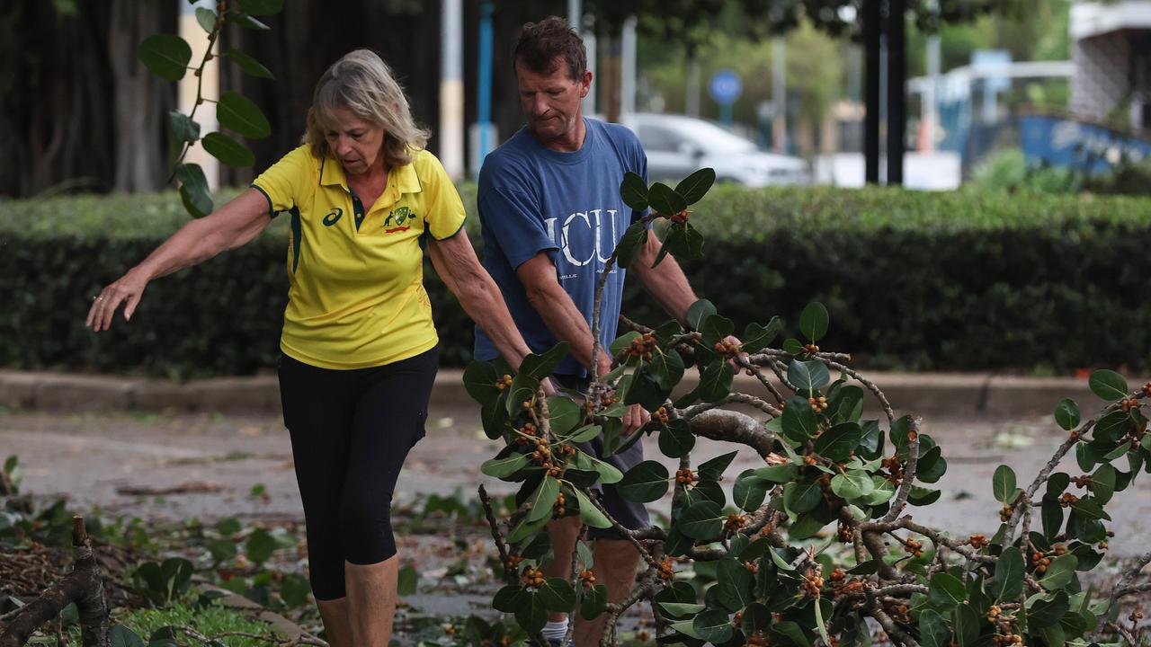 Townsville locals woke early to inspect the damage along The Strand left from TC Kirrily that hit overnight. Picture: Adam Head