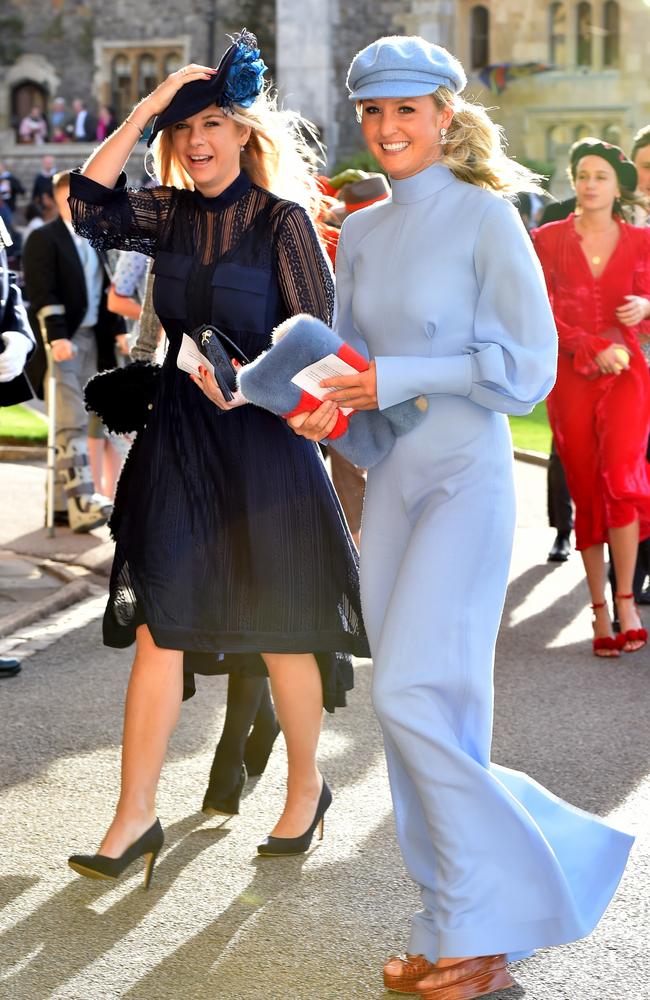 Chelsy Davy (left) and a Smurfette friend. Picture: Matt Crossick/PA Wire