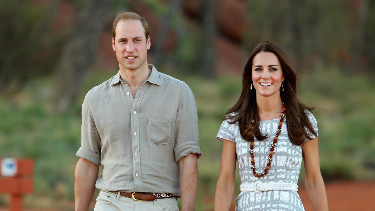 The Duke and Duchess of Cambridge walk down Kuniya Walk at the base of Uluru on April 22, 2014. Picture: Scott Barbour/Getty Images