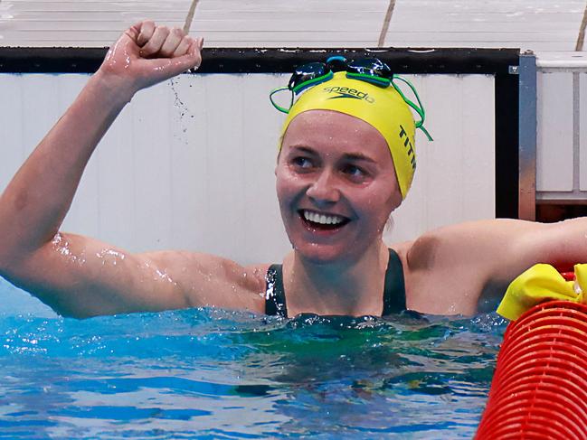 Australia's Ariarne Titmus reacts after taking gold in the final of the women's 400m freestyle swimming event during the Tokyo 2020 Olympic Games at the Tokyo Aquatics Centre in Tokyo on July 26, 2021. (Photo by Odd ANDERSEN / AFP)