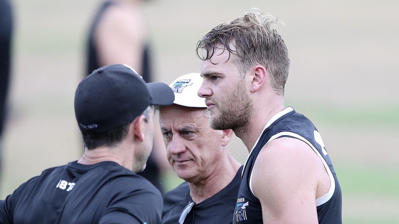Jack Watts talks to medical staff during Port Adelaide’s pre-season camp in Noosa.
