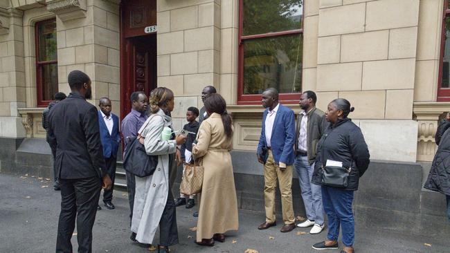 Mr Apai’s family outside the Supreme Court of Victoria on Thursday. Picture: NCA NewsWire / Valeriu Campan