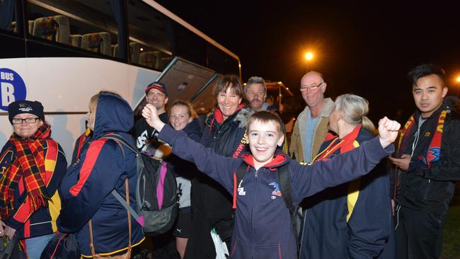 Fans getting ready to board one of the two buses on Thursday night. Picture: Brenton Edwards.