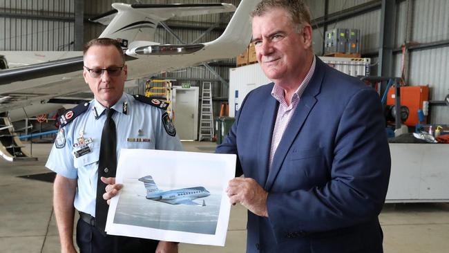 Acting Police Minister Mark Furner and Acting Assistant Commissioner Marcus Hill in October last year announced the new fleet of seven fixed-wing aircraft purchased for Queensland government services. Picture: Liam Kidston