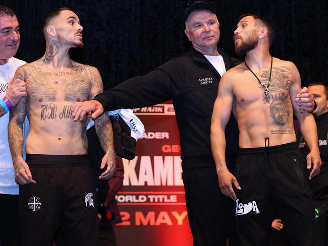 George Kambosos and Vasiliy Lomachenko had to be separated at Saturday’s weigh-ins. Picture: Mikey Williams/Top Rank