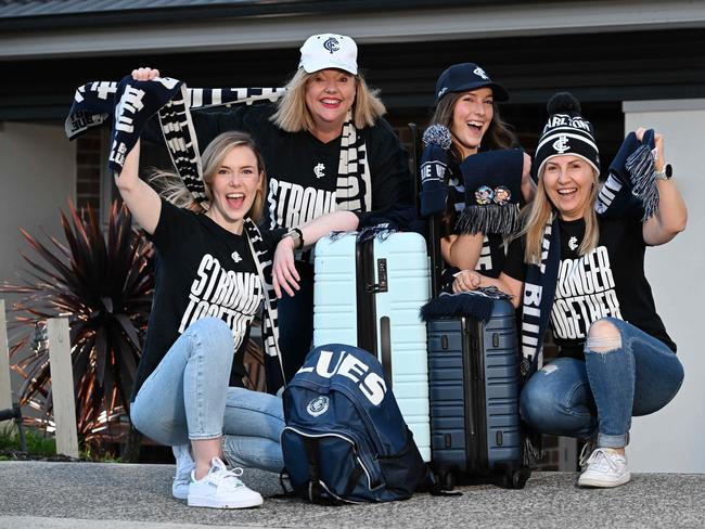 Carlton fans Ebony Anderson with mum Julie Anderson and Kristen Beck with mum Natalie Beck. Picture: Josie Hayden