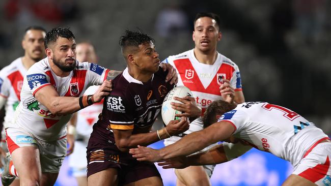 Selwyn Cobbo is tackled during the round 13 NRL match between the St George Illawarra Dragons and the Brisbane Broncos. (Photo by Cameron Spencer/Getty Images)