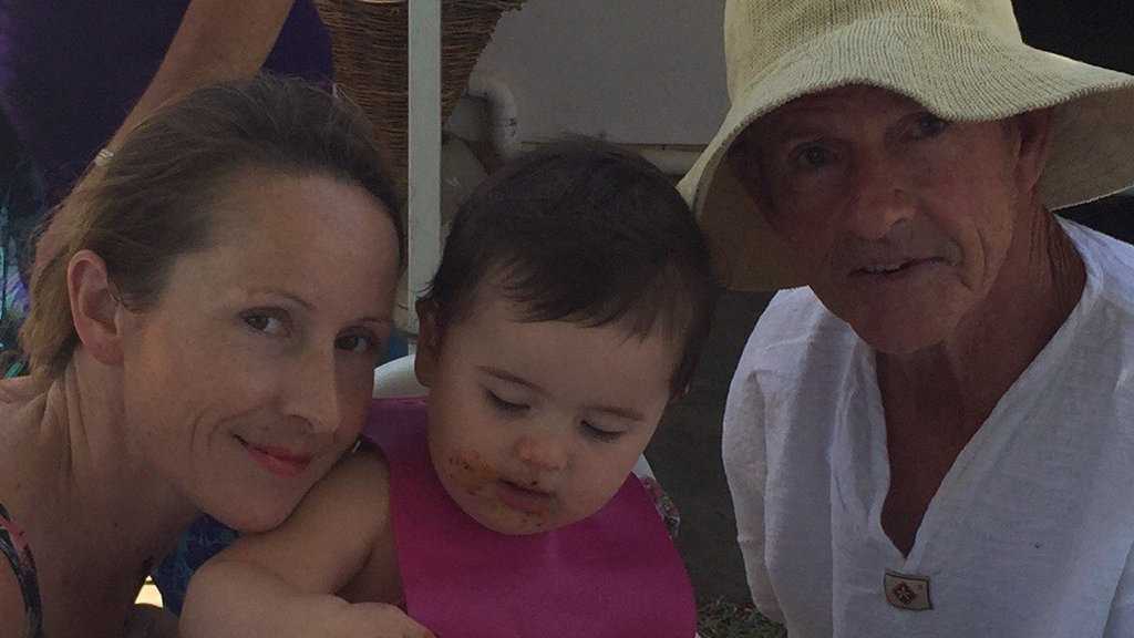 Former Coast surfer Les Norish relaxes with his daughter Suzie and granddaughter Isla. Picture: Contributed