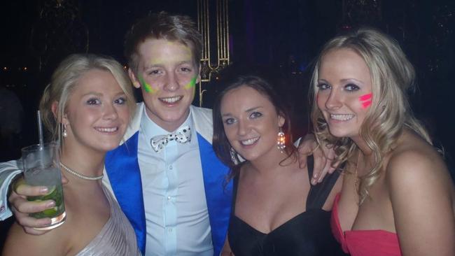 Hugh in bow tie with three friends.