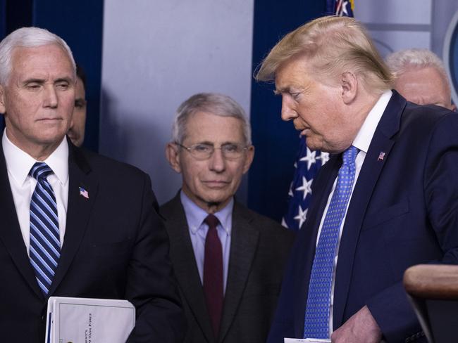 President Donald Trump with Vice President Mike Pence, left, and Dr. Anthony Fauci, director of the National Institute of Allergy and Infectious Diseases. Picture: AP