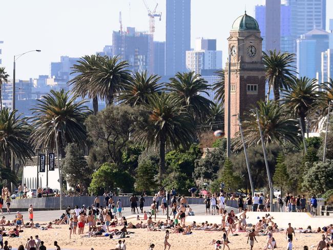 Melbourne is enjoying the hot weather after a long Winter. St Kilda Beach jam packed. Picture: Alex Coppel.