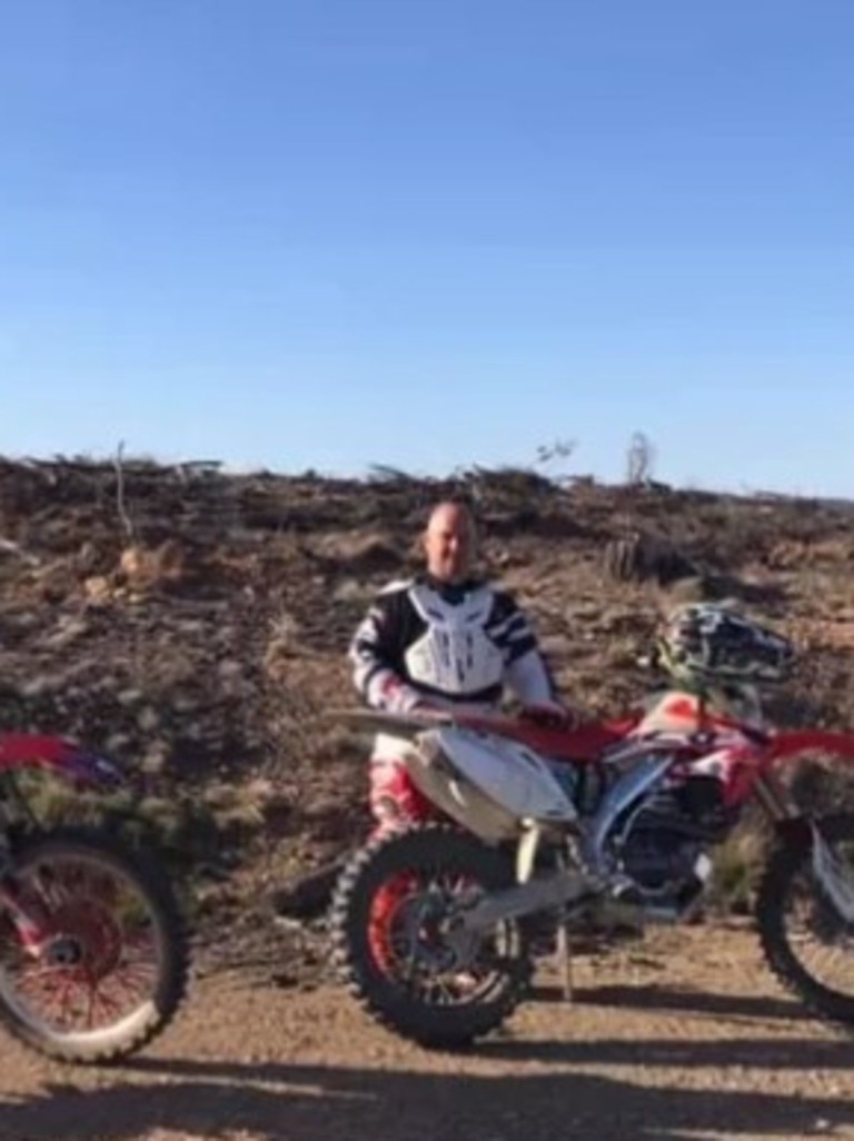 Jason McMahon stands near his motorcycles in a photo shared to a GoFundMe post. Photo: GoFundMe