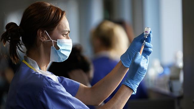 In Britain in January, over 50,000 NHS staff were reported as off sick with COVID. Numbers in developing countries are unknown. Picture: Getty Images