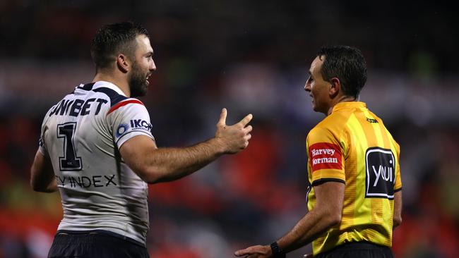 James Tedesco speaks to referee Gerard Sutton. Picture: Jason McCawley/Getty Images