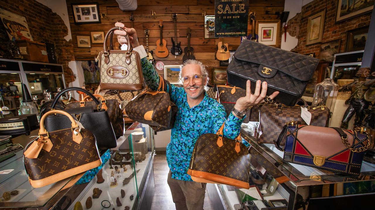 Shael Dawson with designer bags at Monty's in Fortitude Valley. Picture: Nigel Hallett