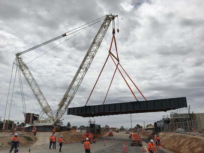 The huge first section of the 720-tonne rail overpass is installed on South Rd as part of the Torrens to Torrens project. Picture: Department Transport