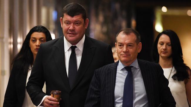 Crown Resorts director James Packer and executive chairman John Alexander arrive to attend the annual general meeting. Picture: AAP