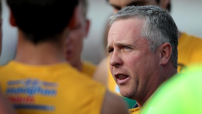 Eagles Coach Michael Godden talks to his players. Picture: DEAN MARTIN