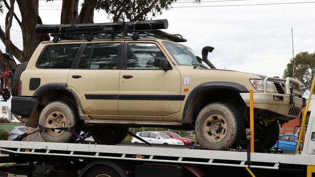 The 4WD seized by police is being transported to a Melbourne forensics lab. Picture: David Caird