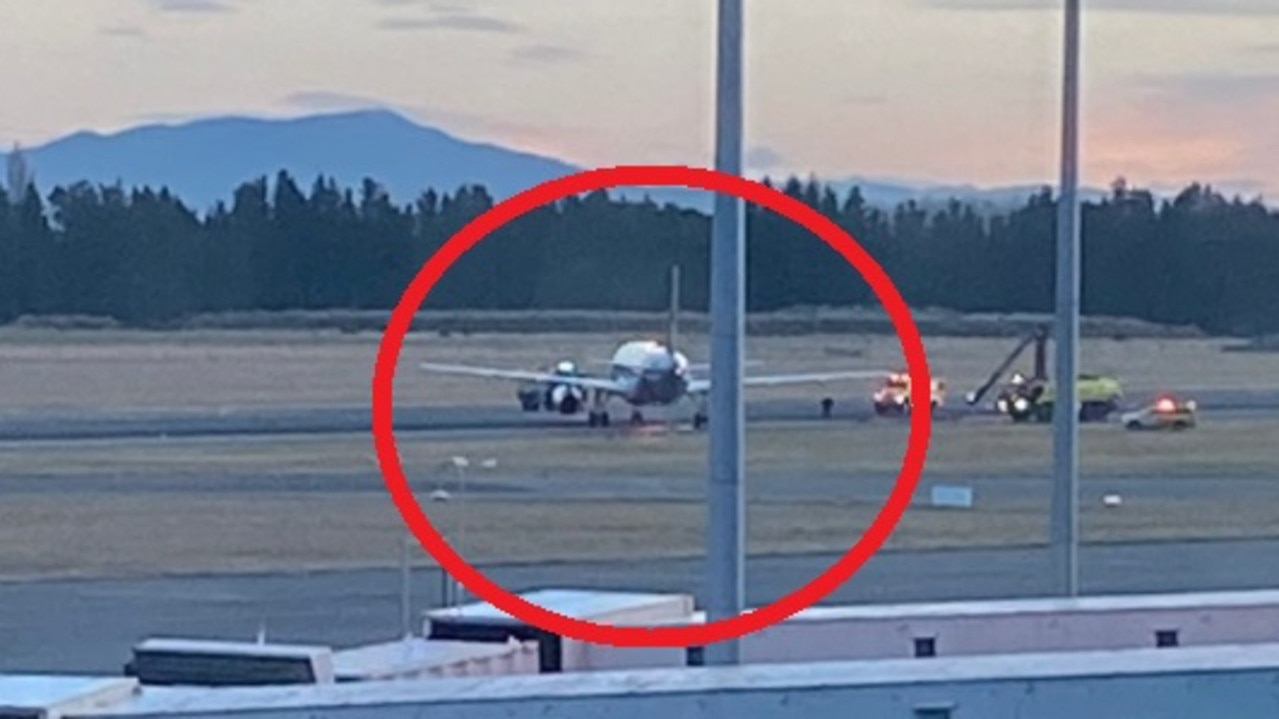 Jetstar plane slides off runway, on to grass