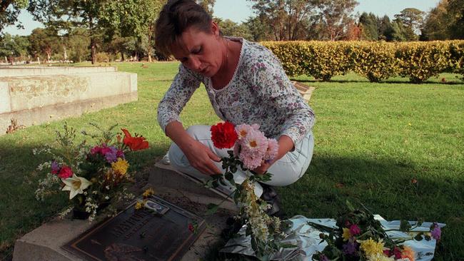 Julie Maybury visits her daughter’s grave 13 years after the murder.