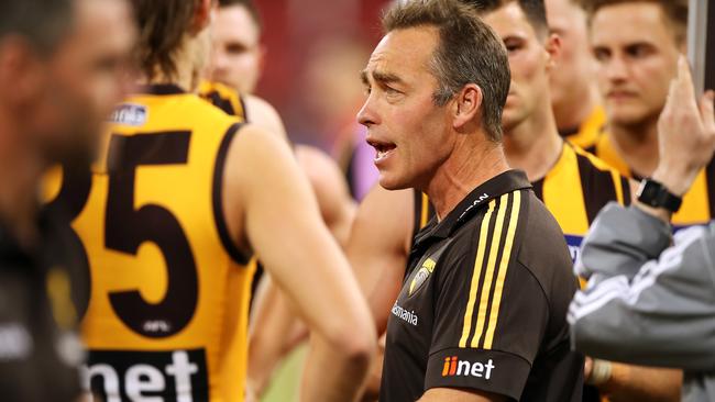 Hawks head coach Alastair Clarkson speaks to his team at Giants Stadium