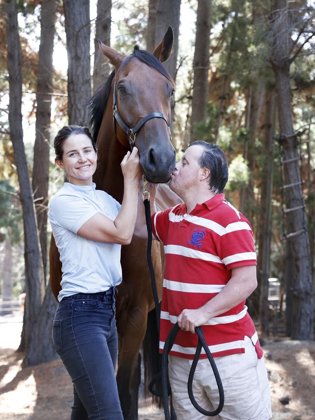 Former Melbourne Cup winning jockey Michelle Payne with brother Stevie Payne and horse Alhambra Lad that will run in the 2024 Hobart Cup. Picture: Nikki Davis-Jones