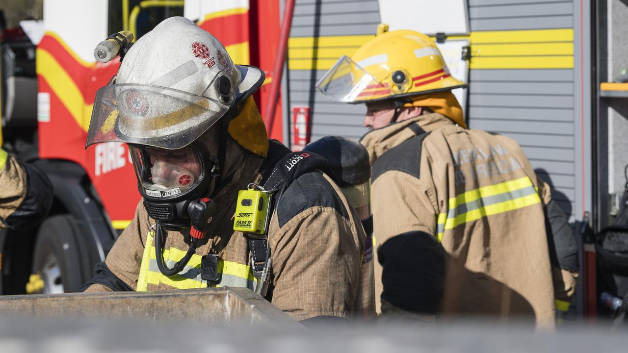 Emergency services attend a fire in a unit complex in James St, Harristown. Picture: Kevin Farmer