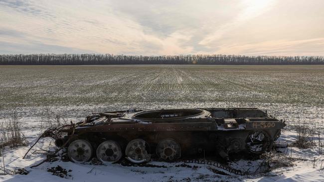 A destroyed armoured military vehicle in a field in Kharkiv amid the Russian invasion of Ukraine. Picture: AFP