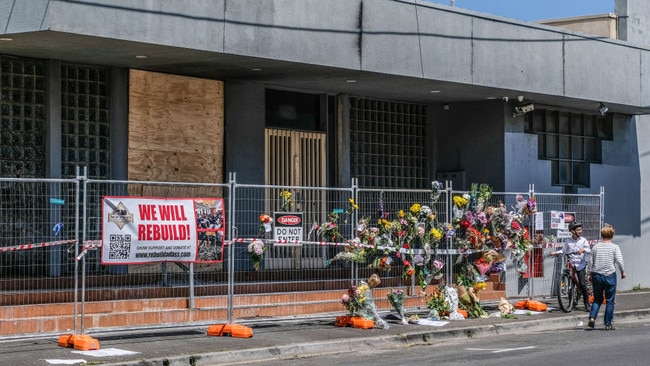 Flowers and messages of hope and support left at the Adass Israel Synagogue in Ripponlea, Melbourne, in the wake of a firebomb attack. Picture: Alexander Bogatyrev/SOPA Images/LightRocket via Getty Images