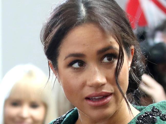 Meghan, Duchess of Sussex (L) and Britain's Prince Harry, Duke of Sussex, attend an event at Canada House, the offices of the High Commision of Canada in the United Kingdom, to mark Commonwealth Day, in central London, on March 11, 2019. - Britain's Queen Elizabeth II has been the Head of the Commonwealth throughout her reign. Organised by the Royal Commonwealth Society, the Service is the largest annual inter-faith gathering in the United Kingdom. (Photo by Chris Jackson / POOL / AFP)